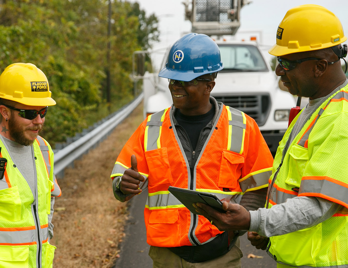 field-employees-smiling-on-jobsite