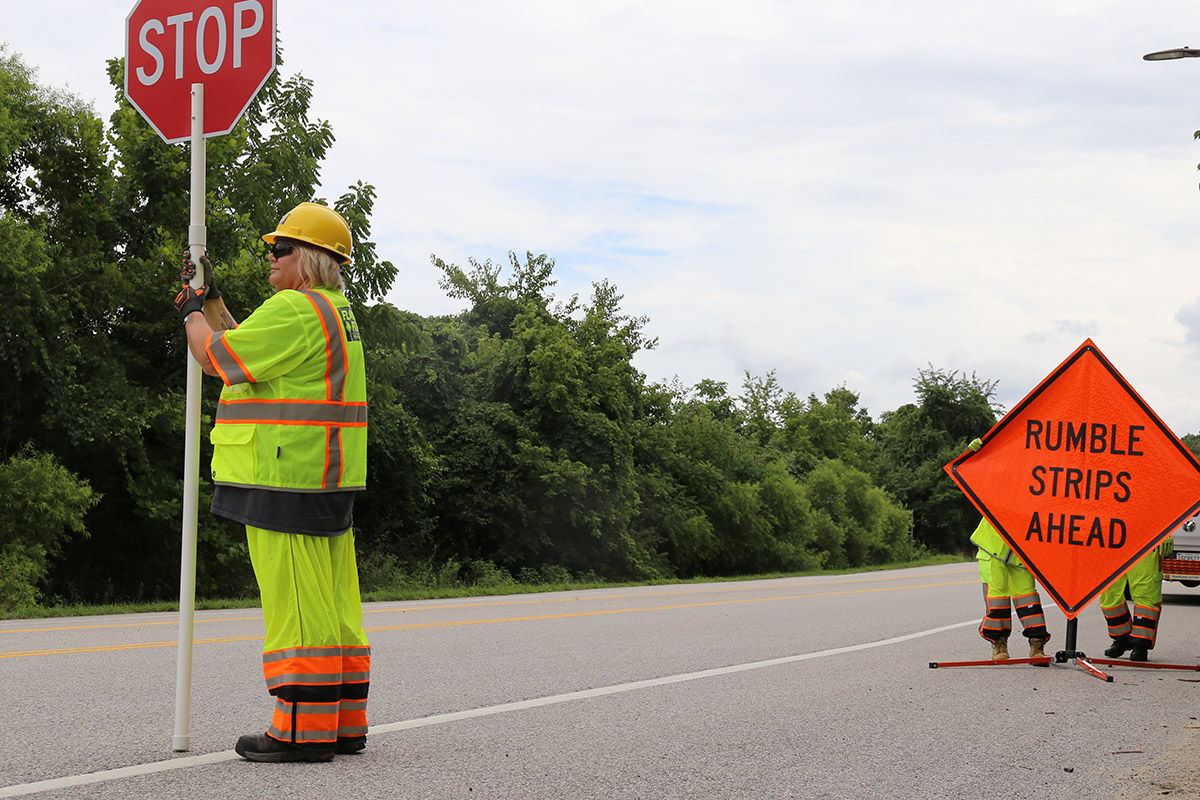 flagger-force-field-crew-setting-up-type-site