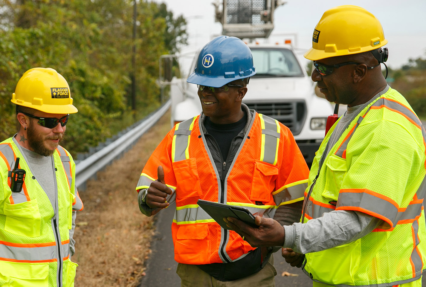 2-feild-employees-smiling-on-jobsite