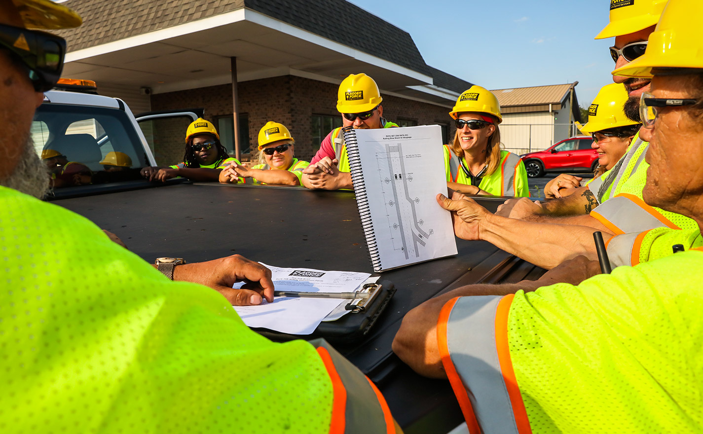 Flagger Force field team discussing jobsite