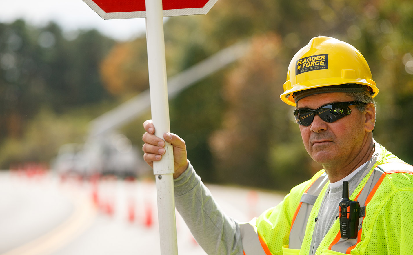 flagger-holding-up-stopsign-on-jobsite
