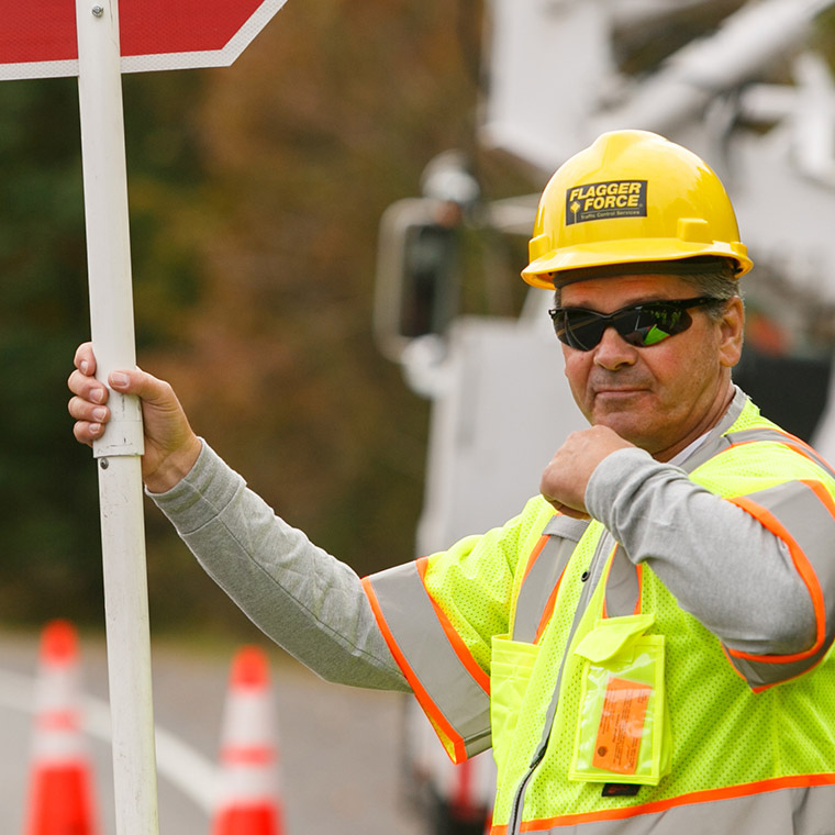 flagger-force-crew-member-holding-stop-sign