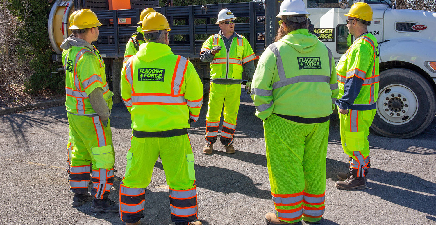 Flagger Force field crew having discussion