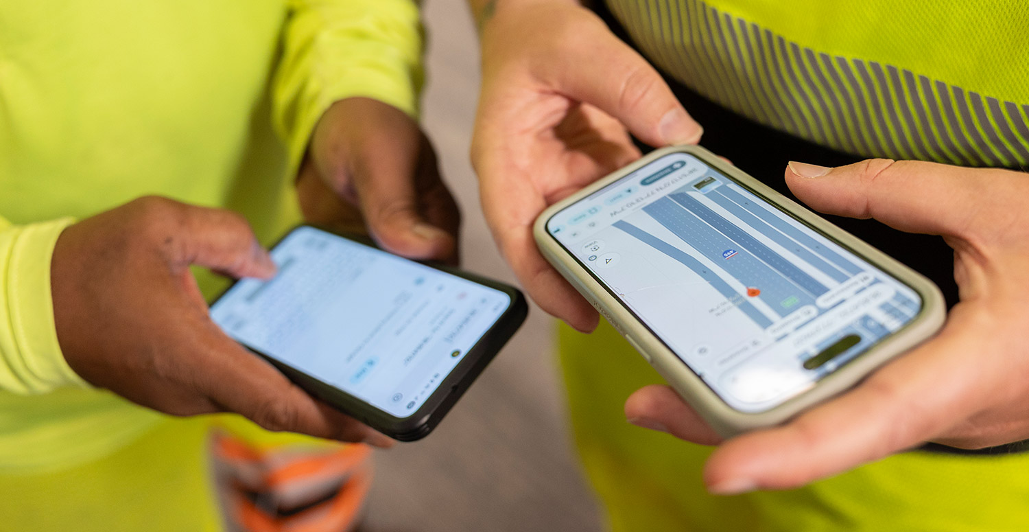 Employees using technology on phone